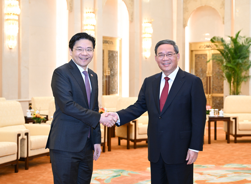 李强会见新加坡副总理兼财政部长黄循财